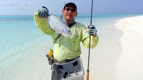 What-a-beautiful-place-to-fish---the-author-with-his-first-Island-Trevally-caught-on-fly
