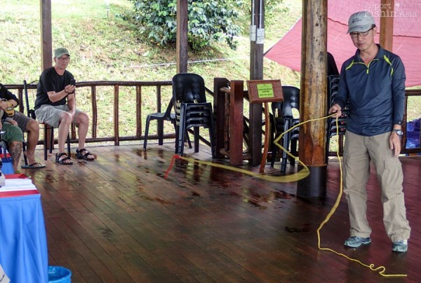 Master Casting Instructor CK Ling demonstrating fly casting using the indoor rod