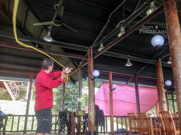 Peter Hayes giving tips on casting accuracy using the indoor casting rod