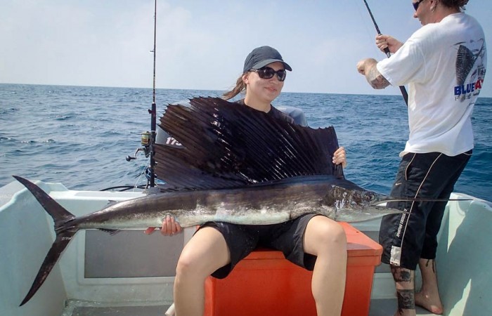 An early double hook-up for the German couple. Eli pictured with her sailfish while Andre battles his fish.