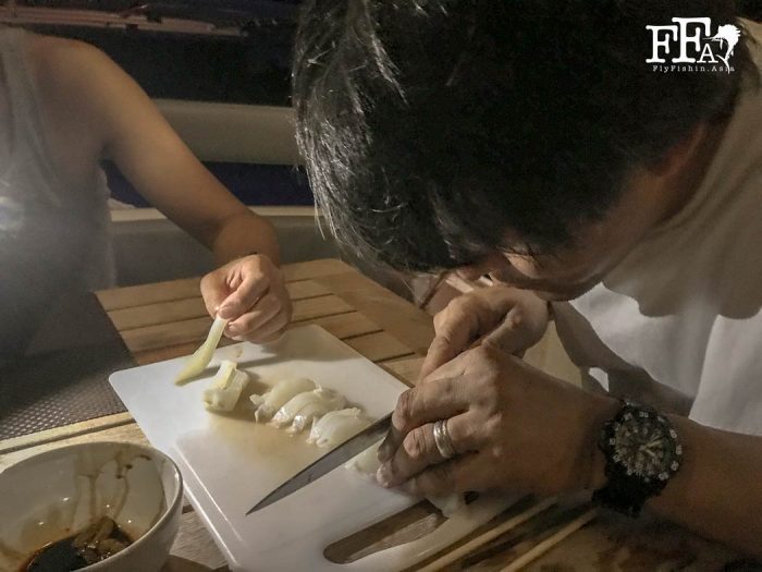 Fresh squid sashimi onboard