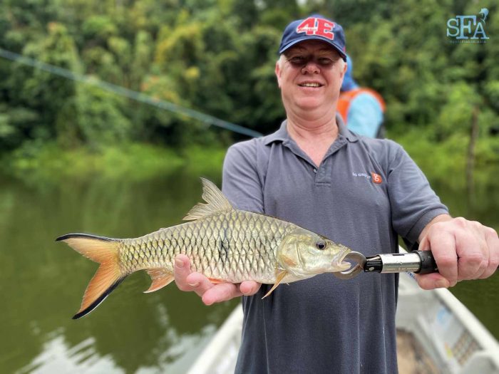 Mark with a nice sebarau shortly after - this one taken with a crankbait